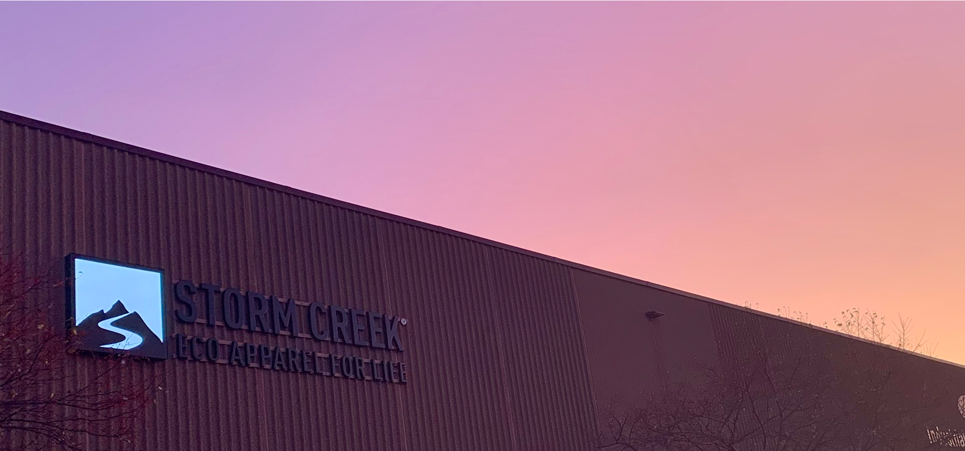 The Storm Creek office with a beautiful sunset behind it
